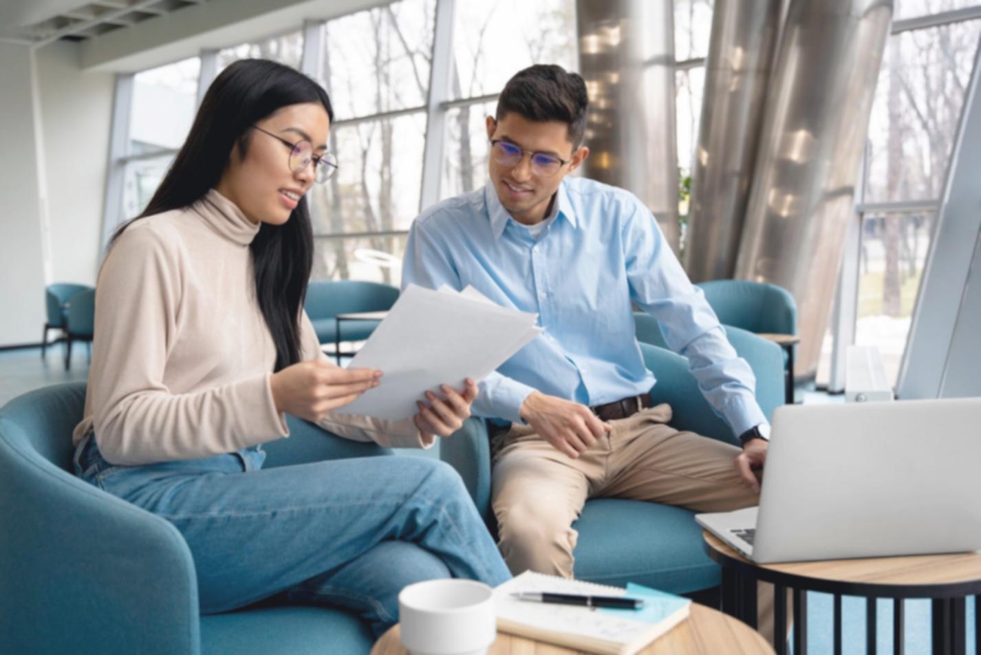 Budget analysis workspace showing trend charts and financial planning materials